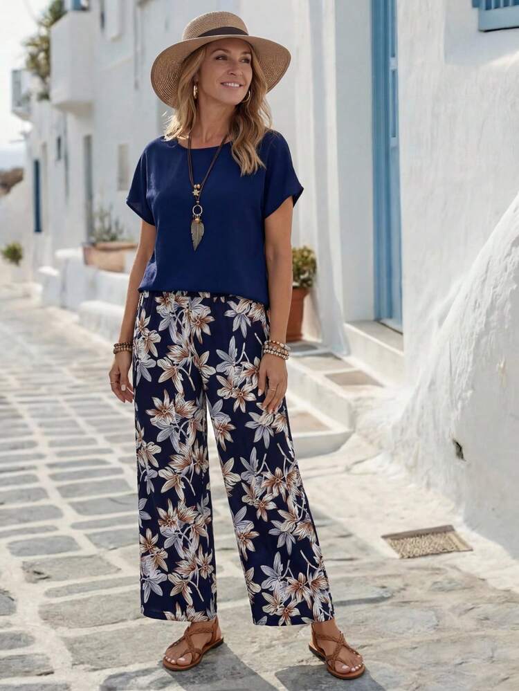 Women Solid Color Round Neck Short Sleeve Top And Flower Print Wide Leg Pants Set For Summer Two Pieces Outfits