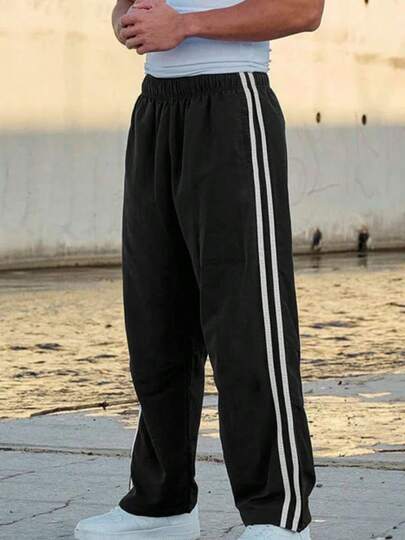 Primavera/otoño Pantalones deportivos para hombre,Ligeros ,Transpirables,Holgados,Rectos,Con rayas,Adecuado para un estilo deportivo informal de uso diario.