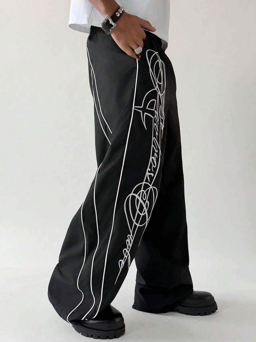 PAVTROS Men's Letter Embroidered Pocket Wide Leg Loose Casual Pants - Black - View 1