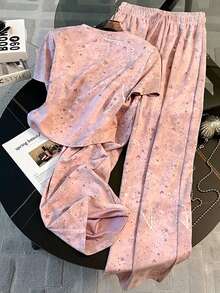 Bộ đồ gồm áo thun tay raglan cổ tròn ngắn và quần ống đứng có túi bên hông. - Hồng - Xem 2