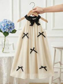 SHEIN 4-7岁女童甜美梦幻3D蝴蝶结雪纺吊带连衣裙，杏色，华丽独特，适合夏季、户外活动、度假、派对、春夏新款 - 杏色 - 查看 1