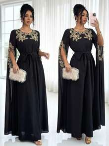 SHEIN Elenzya Vestido largo elegante de cuello redondo con estampado floral, mangas divididas y plisado extra largo, perfecto para el verano. - Negro - Ver 1