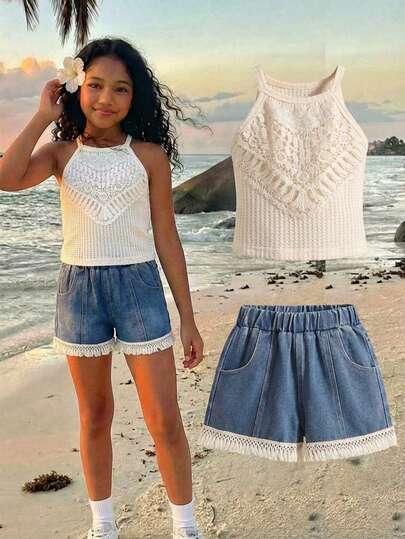 SHEIN Young Girl Outfit. The Top Is A Peach-Colored Sleeveless Camisole With A Hollow Crochet Design, Combining Elegance And Sweetness. The Bottom Is A Light Blue Denim Shorts With Tassel And Lace Trim, Matching The Design Elements Of The Top. The Overall Style Is Fresh And Sweet, Suitable For Summer Daily Wear And Outings, A Popular Children's Summer Fashion In Recent Years, Positioning On "Comfort And Sweetness", A Common Choice For Girls' Summer Clothing.
