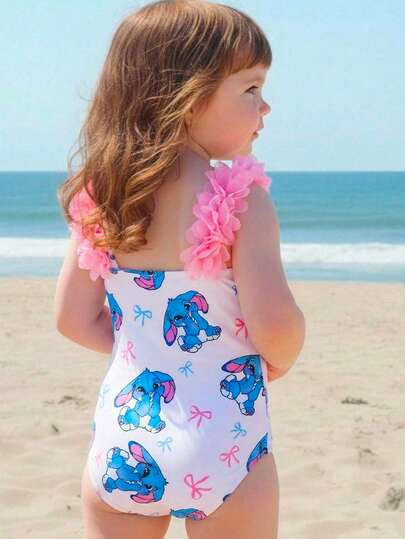 SHEIN Traje de baño de una pieza con estampado de dibujos animados y lazo para niña, para playa y vacaciones