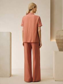 Anewsta 新款夏季度假套装，蕾丝镂空宽松衬衫搭配舒适侧镂空阔腿裤，时尚女士休闲套装 - 珊瑚橙 - 查看 2