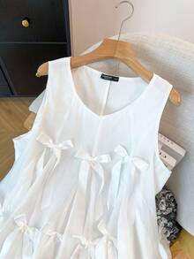 GlowEve CURVE 一款增添青春气息的网状蝴蝶结背心，搭配荷叶边无袖上衣。 - 白色 - 查看 4