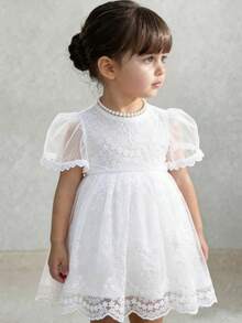 SHEIN Đầm không tay dễ thương cho bé gái, thiết kế giản dị với chi tiết ren trắng. Thích hợp cho các bữa tiệc sinh nhật, sự kiện buổi tối, biểu diễn, đám cưới, lễ rửa tội, lễ hội trường học, mặc hàng ngày, đi học, dã ngoại và mùa xuân/hè. - trắng - Xem 2