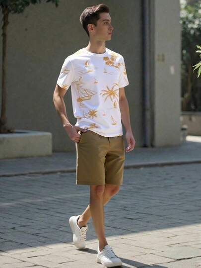 青少年休闲两件套，宽松圆领短袖印花T恤搭配抽绳短裤，饰有热带棕榈树和帆船图案，适合夏季度假和日常穿着。