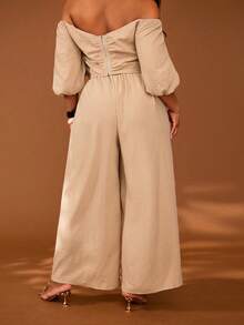 Veslaya 2026春夏大码女装，适合音乐节、复活节、西部风、游牧风、生日派对、毕业典礼、大学、学生、日常穿着、百搭基础款、休闲、度假、邮轮旅行、海滩、日光浴、热门单品、街头风、婚礼宾客波西米亚风、通勤、早午餐、机场、派对、假日郊游、优雅晚宴、舞会等场合。这款卡其色纹理露肩钥匙孔领长泡泡袖系带阔腿长裤两件套，适合游艇、居家办公等场合。 - 卡其色 - 查看 3