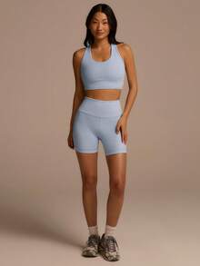 Fluxe Pantalones cortos sin costuras de cintura alta con diseño hueco de unicolor - Celeste - Ver 4