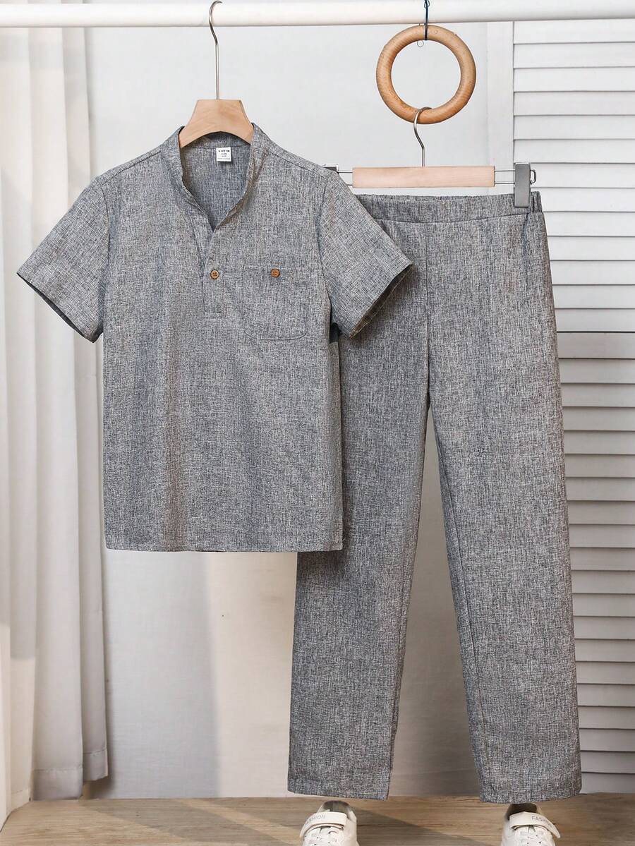 SHEIN Bộ đồ đôi cho bé trai tuổi teen, gồm áo sơ mi ngắn tay cổ chữ V màu trơn dáng rộng, dễ phối đồ, gồm áo và quần cạp chun, thích hợp đi làm, đi học, mặc hàng ngày, chơi thể thao, phù hợp cho mùa xuân/hè. - Xám - Xem 1