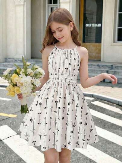 Sparklyn [1-Piece]Tween Girls' Cute & Playful Spring Halter Dress, Featuring Black Bow & Floral Print Pattern, Ruched Elastic Waist Detail, Flowy A-Line Mini Skirt, Sleeveless Halter Neck Design, Lightweight Breathable Fabric, Perfect For Spring Outdoor Picnics, Friend Hangouts, Weekend Errands & Casual Daily Wear