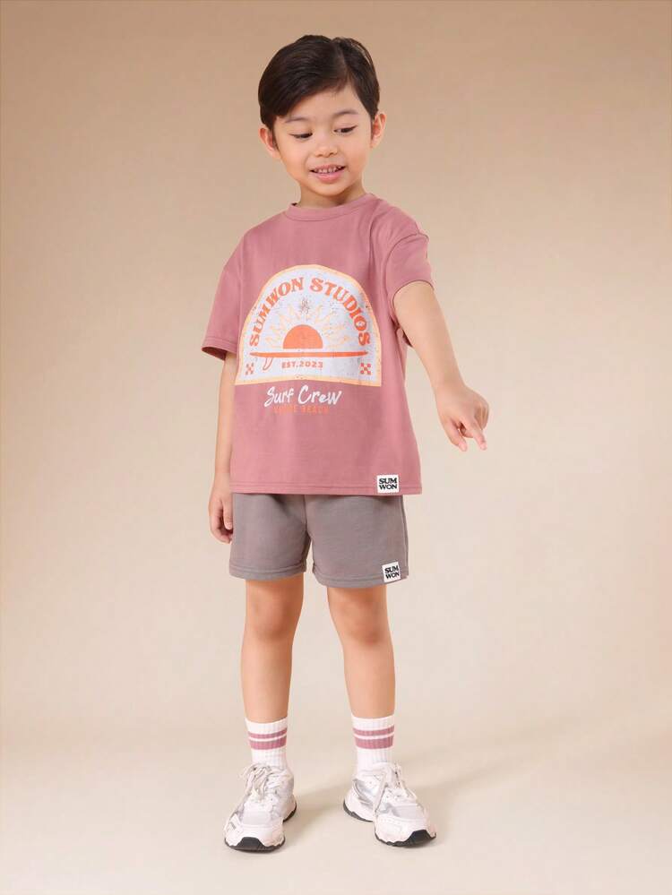 Boys Oversized Pink Surf Crew Graphic T-Shirt And Grey Shorts Summer Co-Ord Set With Mixed Text Print