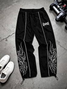 Sport MetroGents Quần thể thao nam in chữ Gothic, cạp chun, có dây rút - màu đen - Xem 1