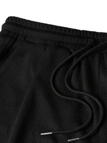 Manfinity CasualCool 男士休闲拼接Polo衫套装，针织钩编面料，黑色Polo衫套装，撞色拼接Polo衫套装，休闲两件套。也是送给丈夫、男友或朋友的理想礼物。 - 黑色 - 查看 4