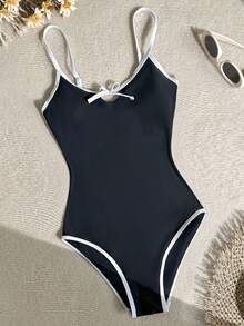 SHEIN Traje de baño de una pieza con adorno de lazo para adolescentes, adecuado para vacaciones en la playa, fiestas en la piscina y fiestas en la playa - Blanco y Negro - Ver 1