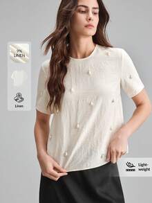 Ontre 亚麻混纺象牙白舒适吸湿修身圆领短袖衬衫，配珍珠纽扣，现代都市浪漫优雅复古风格，适合邮轮、婚礼宾客、商务休闲、办公室穿着，四季皆宜，波西米亚风度假装扮，海滩和海边女装，乡村音乐会风格，西部风格服装，游牧休闲时尚，现代都市时尚商务休闲女装，办公室女装短袖上衣，夏季女装上衣，优质上衣 - 白色 - 查看 2