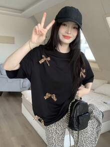 DAZY Áo thun ngắn tay cổ tròn in họa tiết nơ và da báo dành cho thiếu nữ - màu đen - Xem 5