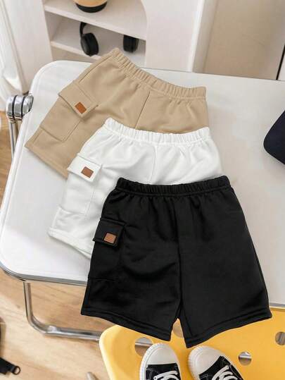SHEIN 3pcs Young Boys' Casual Comfortable Pocket Decor Knit Shorts Set