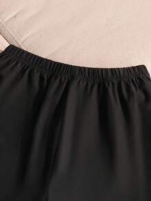 SHEIN Bộ 2 món cho bé gái tuổi teen: Áo croptop hai dây phối màu tương phản thanh lịch và quần ống đứng dệt họa tiết nơ, trang phục thường ngày, đi nghỉ mát, dự tiệc. - màu đen - Xem 9