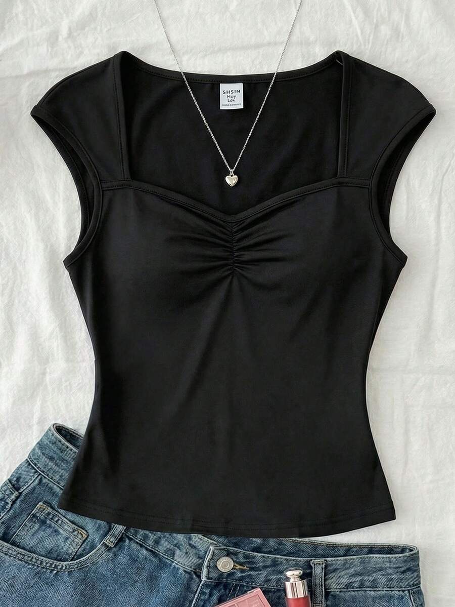 SHEIN Áo thun nữ dệt kim màu trơn nhún ngực, trở lại trường, dễ thương, trang phục dã ngoại ngoài trời mùa xuân cho gia đình ngày lễ, áo đen, phù hợp với nhiều dịp khác nhau - màu đen - Xem 1