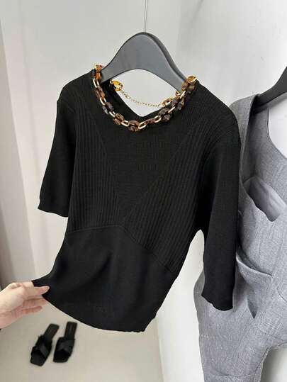 Franclia Blusa de punto fino negra de talla grande con cuello redondo, manga corta, hombros caídos, cintura ceñida y cadena ajustable de ámbar, diseño de moda casual minimalista para uso diario, vacaciones y fiestas