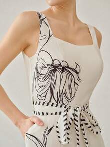 MOTF PREMIUM WOMEN'S EUROPEAN AND AMERICAN STYLE APRICOT PRINTED CAMISOLE WITH TIE WAIST AND LOOSE PRINTED WIDE LEG JUMPSUIT - Apricot - View 1