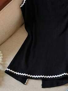 GlowEve 女士新款休闲通勤旅行上衣，纹理面料，不对称下摆，不对称肩部设计，撞色波浪纹缎带，适合女性在秋季、情人节、新年、节日、万圣节、圣诞节等场合穿着。 - 黑色 - 查看 3