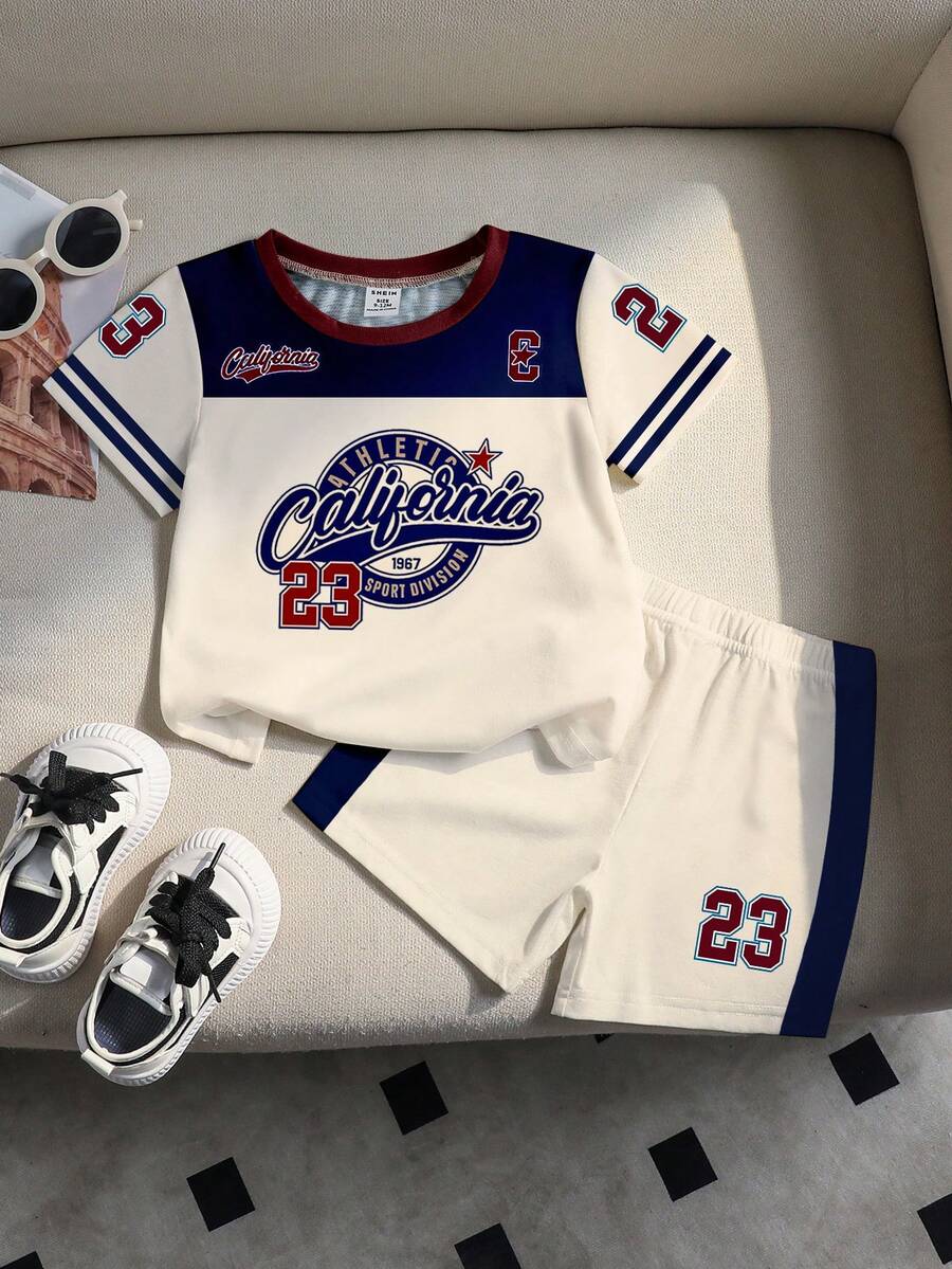 SHEIN GraphicGems 一套男婴休闲运动风圆领短袖T恤短裤套装,印有数字23和加州字母图案,适合户外、运动、上学、春夏穿着。 - 彩色 - 查看 1