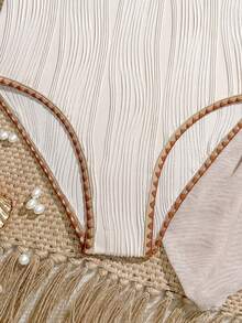 SHEIN Bộ áo tắm liền thân và váy sarong màu hồng đào nhạt dành cho thiếu nữ, họa tiết vỏ sò lượn sóng, mang đến phong cách biển cả dịu dàng. - Màu be - Xem 4