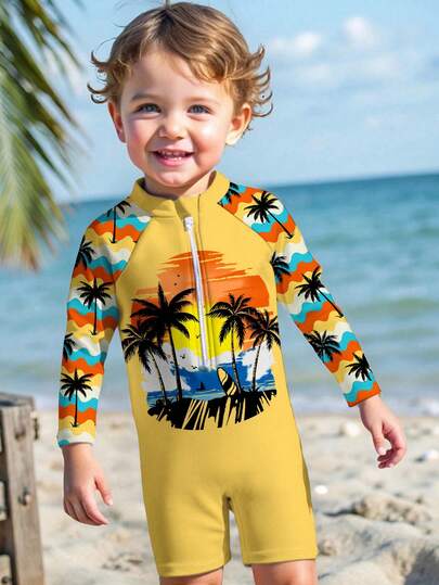 SHEIN Young Boy's Casual Slim Fit Long Sleeve One-Piece Swimsuit, Suitable For Summer. Classic Cool Graphic Print With Sunrise, Palm Tree, And Wave Patterns, Suitable For Beach, Swimming, And Surfing