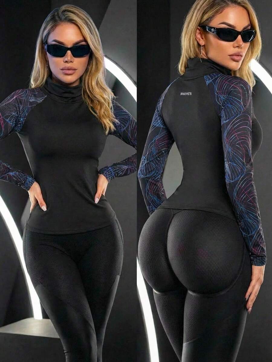 Innovista Top de ropa deportiva con cuello alto y mangas raglán con estampado gráfico - Negro - Ver 1