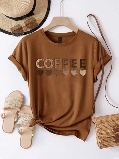 SHEIN CURVE+ Plus-Size Women's Casual Round Neck Short-Sleeved T-Shirt With Coffee Heart Print, Perfect For Summer.
