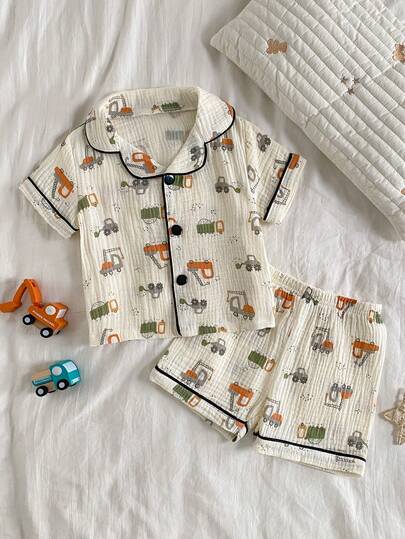 Conjunto de pijama de niño bebé de 100% algodón con estampado de excavadora de dibujos animados, con camisa de manga corta con botones y pantalones cortos