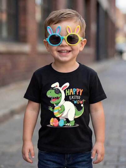 SHEIN Playful Pals Infant/Toddler Boys' Easter Dinosaur & Letter Print Crew Neck Short Sleeve T-Shirt, Infant/Toddler Boys' Apparel, Infant/Toddler Boys' Tops, Infant/Toddler Boys' Pullover, Infant/Toddler Boys' Short Sleeve Tee, Suitable For Easter, Party, Casual, Sweet & Cute, Dinosaur & Letter Design, Suitable For Spring/Summer, Fits 6M-3T