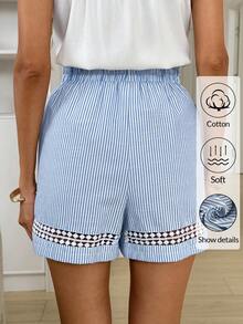 Easowa Quần short nữ mùa hè kẻ sọc dáng rộng có dây rút. Quần short nữ bằng cotton mềm mại kẻ sọc với dây rút và viền ren tinh tế cho sự thoải mái mùa hè. Quần short nữ kẻ sọc xanh trắng thời trang với eo chun, túi và viền ren trang trí cho trang phục thường ngày mùa hè. Trang phục mùa xuân. Trang phục nghỉ hè cho nữ. Quần short mùa hè. Quần short thường ngày. Quần short có dây rút. Quần short nữ. - Nhiều màu - Xem 4