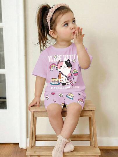 SHEIN 2pcs Baby Girl Casual Lavender Tee & Bike Shorts Set, Featuring Cute Cartoon Cat, Cake, Rainbow, Floral Prints, Suitable For Spring/Summer Daily Wear, Street Style, Home, Vacation
