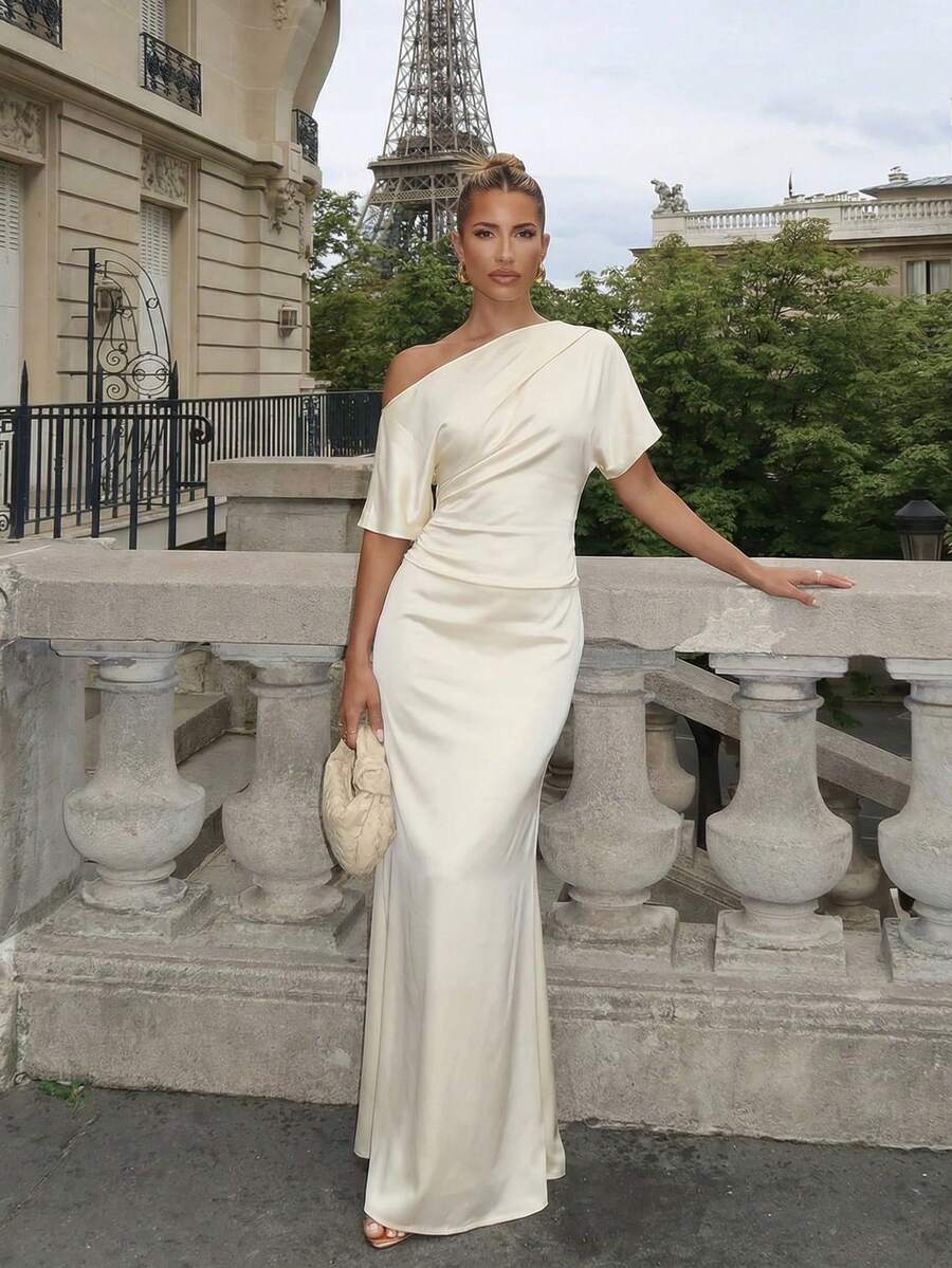 Lumalex 优雅象牙色二合一长款连衣裙，采用不对称单肩领口设计，垂褶短袖，塑形收腰，缝线清晰的紧身胸衣，光滑缎面面料，修身直筒长款连衣裙，完美适用于夏季、春假旅行、邮轮旅行、海滩周末、度假、派对、约会之夜、婚礼、舞会、宴会、生日、嘉年华、节日和其他假日活动。这款连衣裙展现了浪漫的情人节氛围、新潮少女的魅力、波西米亚休闲风、低调奢华、商务时尚以及轻松度假的优雅气质。荷叶边下摆修身长袖连衣裙：层次丰富，点缀闪亮元素，是参加奢华舞会、招待会、宴会、婚礼、锐舞派对、节日庆典、假日聚会和户外晚间活动的理想之选——无论何时您需要打造精致而又引人注目的派对造型，它都是您的完美之选。