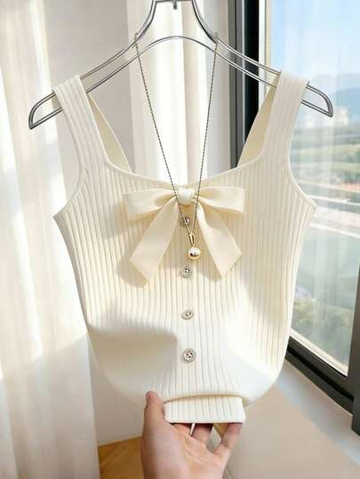 Franclia Parte superior de tirantes con decoración de lazo y botones al frente, estilo francés, para primavera/verano, sin mangas, blanca, ropa casual elegante y versátil para uso diario, atuendo profesional urbano para maestros