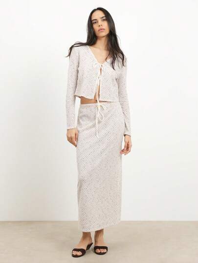 KSTM Saia longa feminina de tricô com cintura ajustável por cordão, textura de crochê, cor bege/creme, estilo casual para outono/inverno.