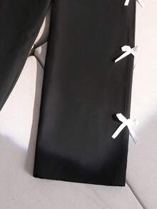 SHEIN Bộ 2 món cho bé gái tuổi teen: Áo croptop hai dây phối màu tương phản thanh lịch và quần ống đứng dệt họa tiết nơ, trang phục thường ngày, đi nghỉ mát, dự tiệc. - màu đen - Xem 7