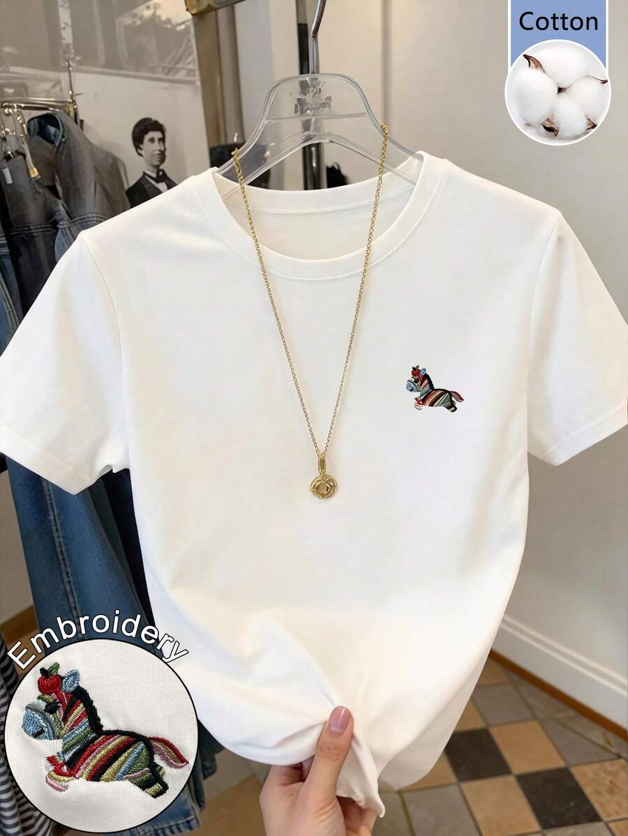 GlowEve Women's White T-Shirt, Organic Cotton Tee, Loose Fit Round Neck Short Sleeve, Rainbow Pony Embroidered Casual Top - White - View 1
