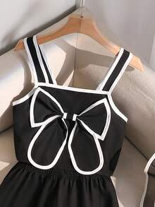 SHEIN Bộ 2 món cho bé gái tuổi teen: Áo croptop hai dây phối màu tương phản thanh lịch và quần ống đứng dệt họa tiết nơ, trang phục thường ngày, đi nghỉ mát, dự tiệc. - màu đen - Xem 8