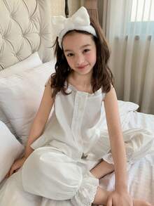 Dazy Kids Bộ đồ ngủ cho bé gái tuổi teen gồm áo hai dây viền bèo nhún và quần ống loe, thích hợp cho mùa thu. - trắng - Xem 6