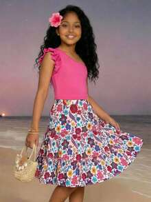 两件套少女夏季套装！单肩荷叶边上衣，色彩亮丽；印花层叠百褶裙，色彩鲜艳。撞色设计，时尚百搭，可单独穿着，也可整套搭配。适合外出、派对等各种场合——甜美又酷炫的女孩造型必备单品。 - 彩色 - 查看 10