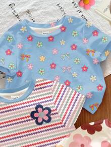 SHEIN LMoss Kids 3件套女童可爱多巴胺花卉系列奶油白、多巴胺彩色条纹蓝色短袖圆领基础款T恤，休闲百搭，适合所有季节日常、居家、度假穿着，舒适透气，春夏时尚休闲，儿童花卉条纹图案服装，时尚夏季，冬季新款，清凉舒适。 - 彩色 - 查看 3