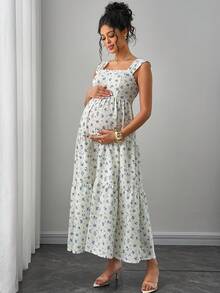 Momance Maternity Dress With Wide Shoulder Straps, Ruffle Trim, Criss-Cross Tie Back, Bowknot Accent, Fitted A-Line Silhouette, Multi-Tiered Cake Skirt, Floral Print Maxi Dress - Blue and White - View 3
