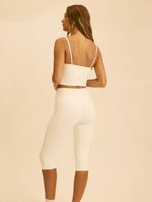 Aralina Bộ đồ thể thao nữ gồm áo hai dây ngắn màu trơn và quần legging lửng 7/8. - trắng - Xem 2