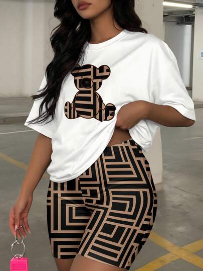 Slaydiva Plus Size Casual Streetwear Fashion Bear Graphic Tee And Geometric Print Shorts 2 Pieces Set Summer Outfits Women Two Piece Sets Short Two Piece Casual Sets Women Summer Outfits 2 Piece Womans 2 Piece Sets Women 2 Piece Outfit Casual