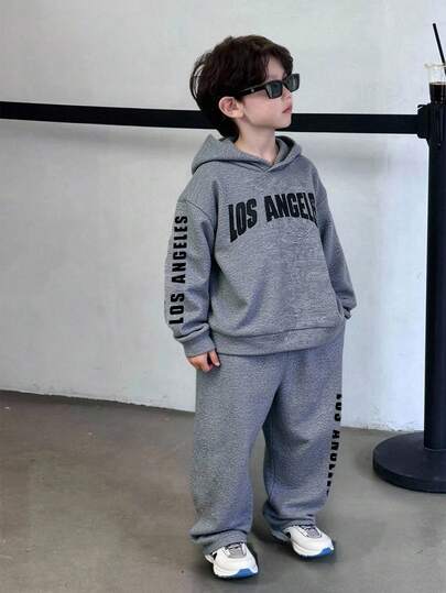 SHEIN 2 件套年轻男孩休闲街头韩版扎染连帽衫和纯色松紧腰运动裤套装，适合节日派对、秋冬季